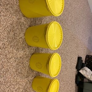 Set of 4 yellow vintage Tupperware canisters